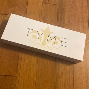 This TYME curling iron has only been used twice. It’s good as new!